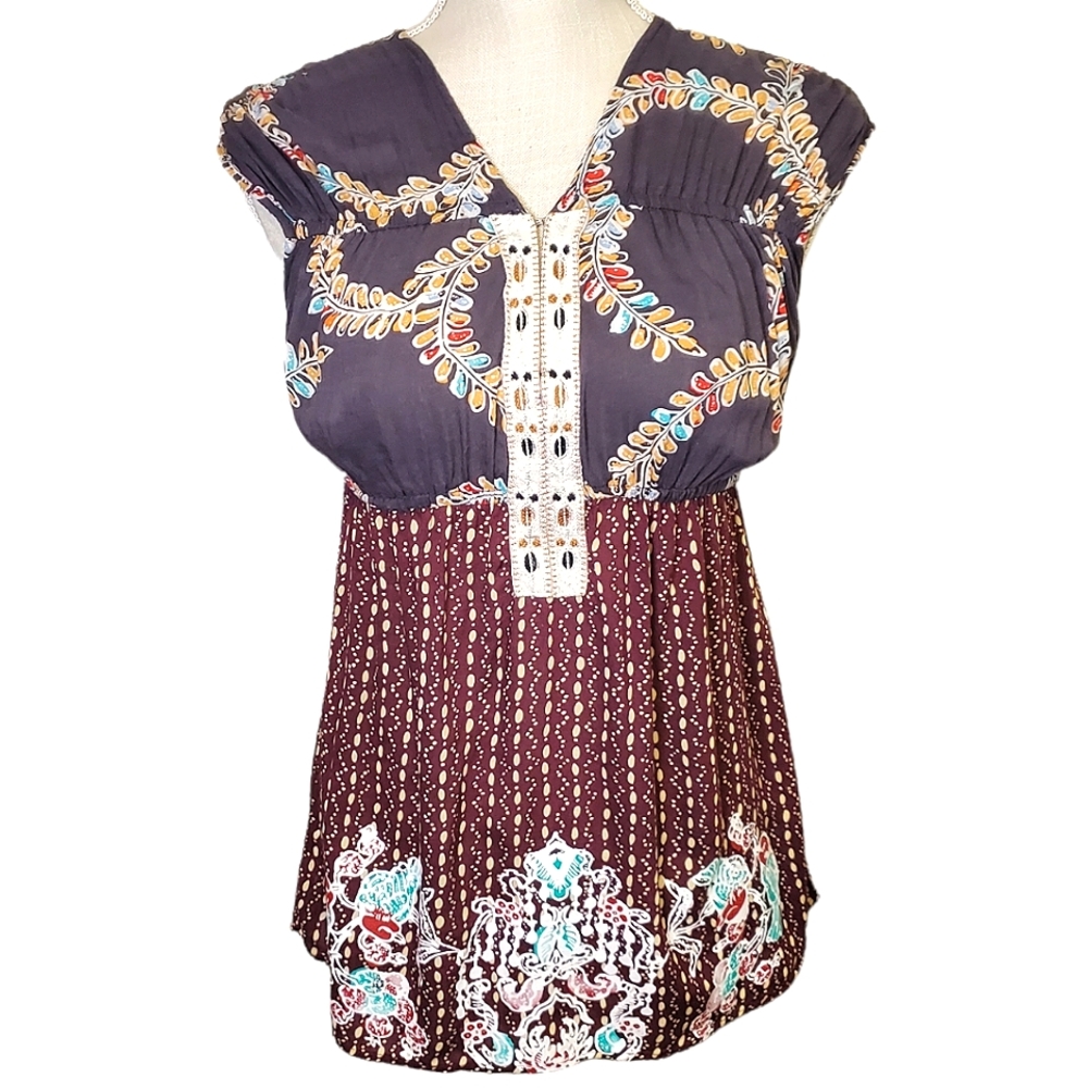 FREE PEOPLE | Women's multi-color/pattern boho peplum blouse. Size XS.